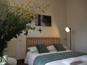 A bed or beds in a room at Open Cascina
