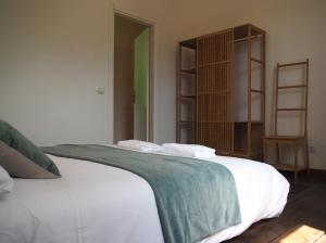 A bed or beds in a room at Open Cascina
