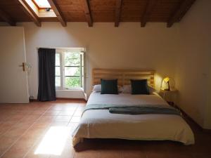A bed or beds in a room at Open Cascina