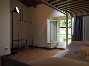 A bed or beds in a room at Open Cascina
