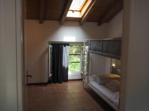 A bed or beds in a room at Open Cascina
