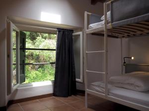 A bed or beds in a room at Open Cascina