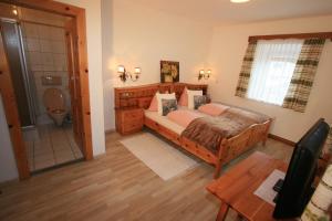 Postel nebo postele na pokoji v ubytování Hotel Stadlwirt + 37 fotografií