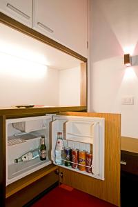 Kuchyň nebo kuchyňský kout v ubytování Hotel Silvana