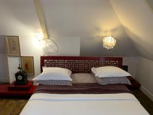 Postel nebo postele na pokoji v ubytování Chambres d'Hôtes Villa Mon Repos