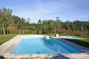 Bazén v ubytování Casa Da Quinta Do Rei nebo v jeho okolí