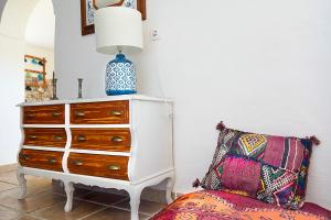 A bed or beds in a room at Casa del Arrabal