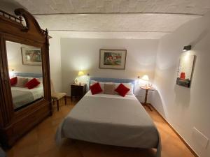 A bed or beds in a room at La Casa Di Ago