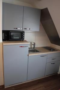 Kuchyň nebo kuchyňský kout v ubytování Ferienhaus Storchennest