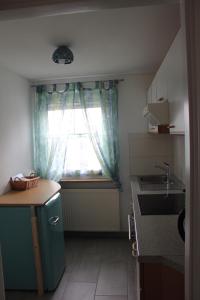 Kuchyň nebo kuchyňský kout v ubytování Ferienhaus Storchennest
