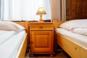 Posteľ alebo postele v izbe v ubytovaní Apartament 3a