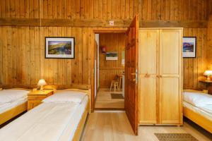 Posteľ alebo postele v izbe v ubytovaní Apartament 3a