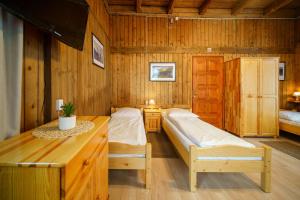 Posteľ alebo postele v izbe v ubytovaní Apartament 3a