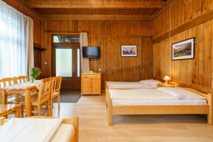Posteľ alebo postele v izbe v ubytovaní Apartament 3a
