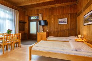Posteľ alebo postele v izbe v ubytovaní Apartament 3a