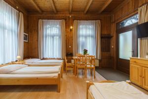 Posteľ alebo postele v izbe v ubytovaní Apartament 3a