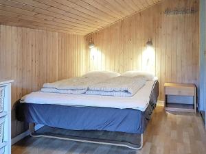 Postel nebo postele na pokoji v ubytování 10 person holiday home in Hjørring-By Traum