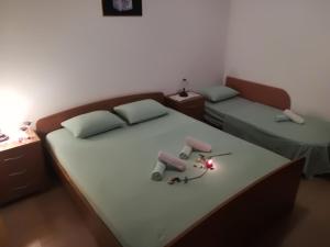 Postel nebo postele na pokoji v ubytování Apartment Nela