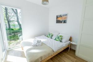 Posteľ alebo postele v izbe v ubytovaní Mazurski Widok