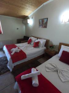 Postel nebo postele na pokoji v ubytování Hotel Bicaj