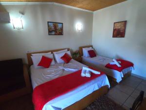 Postel nebo postele na pokoji v ubytování Hotel Bicaj