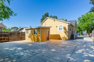 a house with a driveway and a fence at @ Marbella Lane Mini Guest House in Downtown San Jose in San Jose