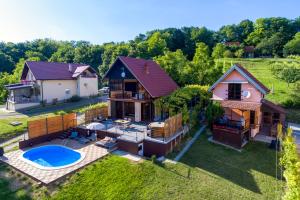 an aerial view of a house with a swimming pool at Juras Country House, bazen, sauna ,hot tube,vrt in Sveti Ivan Zelina