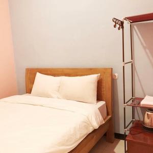 Ein Bett oder Betten in einem Zimmer der Unterkunft RoomZ Budget Residence