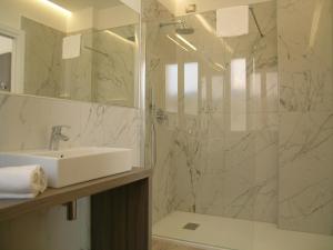 Um banheiro em Hotel Belvedere