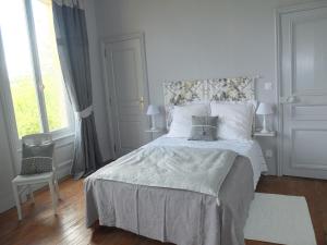 Postel nebo postele na pokoji v ubytování Gite de la Bucaille