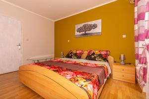 Postel nebo postele na pokoji v ubytování Apartmani Jasminka