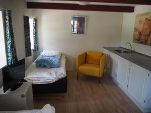 Posezení v ubytování Blåvandshuk Golf Hostel