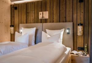 Ein Bett oder Betten in einem Zimmer der Unterkunft Werdenfelserei