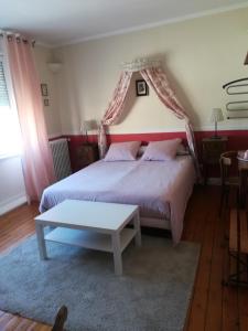 Cama o camas de una habitación en Chambres d'Hôtes de la 101ème