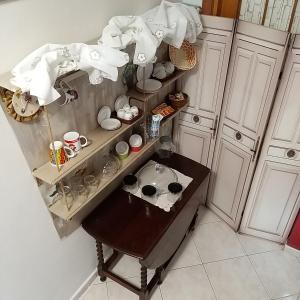 Kuchyň nebo kuchyňský kout v ubytování B & B Arco di Sole