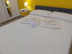 Postel nebo postele na pokoji v ubytování B&b Passione del sud