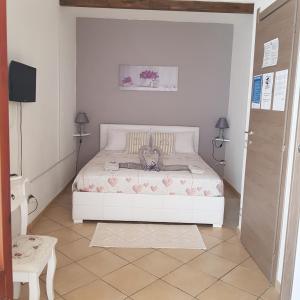 Кровать или кровати в номере La Rotonda sul mare