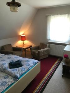 Postel nebo postele na pokoji v ubytování Rheinblickzimmer