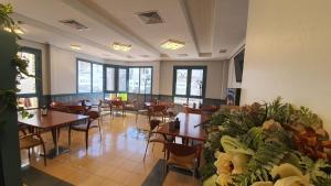Posedenie v ubytovaní Hostal La Palmera