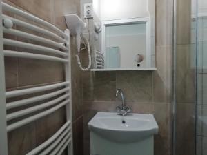 Un baño de Árpád-ház Apartmanok