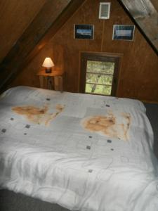 En eller flere senge i et værelse på chalet ST PIERRE DELS FORCATS