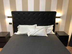 Posteľ alebo postele v izbe v ubytovaní B&B Il Viaggiatore