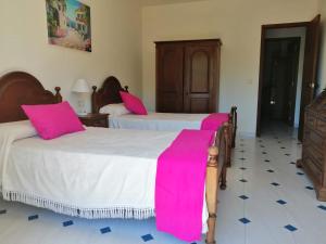 Кровать или кровати в номере Playa Montalvo