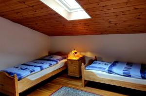 En eller flere senge i et værelse på Zur alten Schmiede