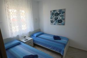 A bed or beds in a room at Villa La Bomboniera