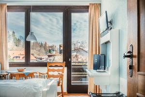 TV a/nebo společenská místnost v ubytování Hotel Jakob