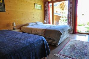 Ένα ή περισσότερα κρεβάτια σε δωμάτιο στο Bed & Breakfast l'Epicéa
