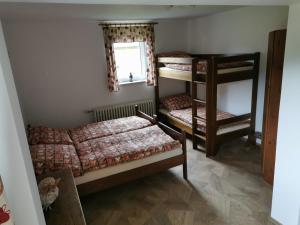Posteľ alebo postele v izbe v ubytovaní U Waltera