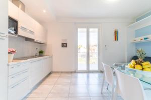 Kuchyň nebo kuchyňský kout v ubytování Mavip Residence