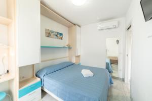 Postel nebo postele na pokoji v ubytování Mavip Residence
